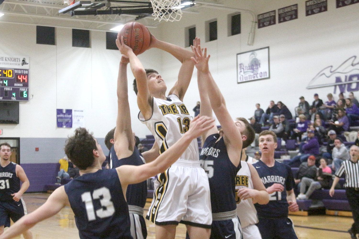Cory Kruger goes up for a contested shot under the basket.