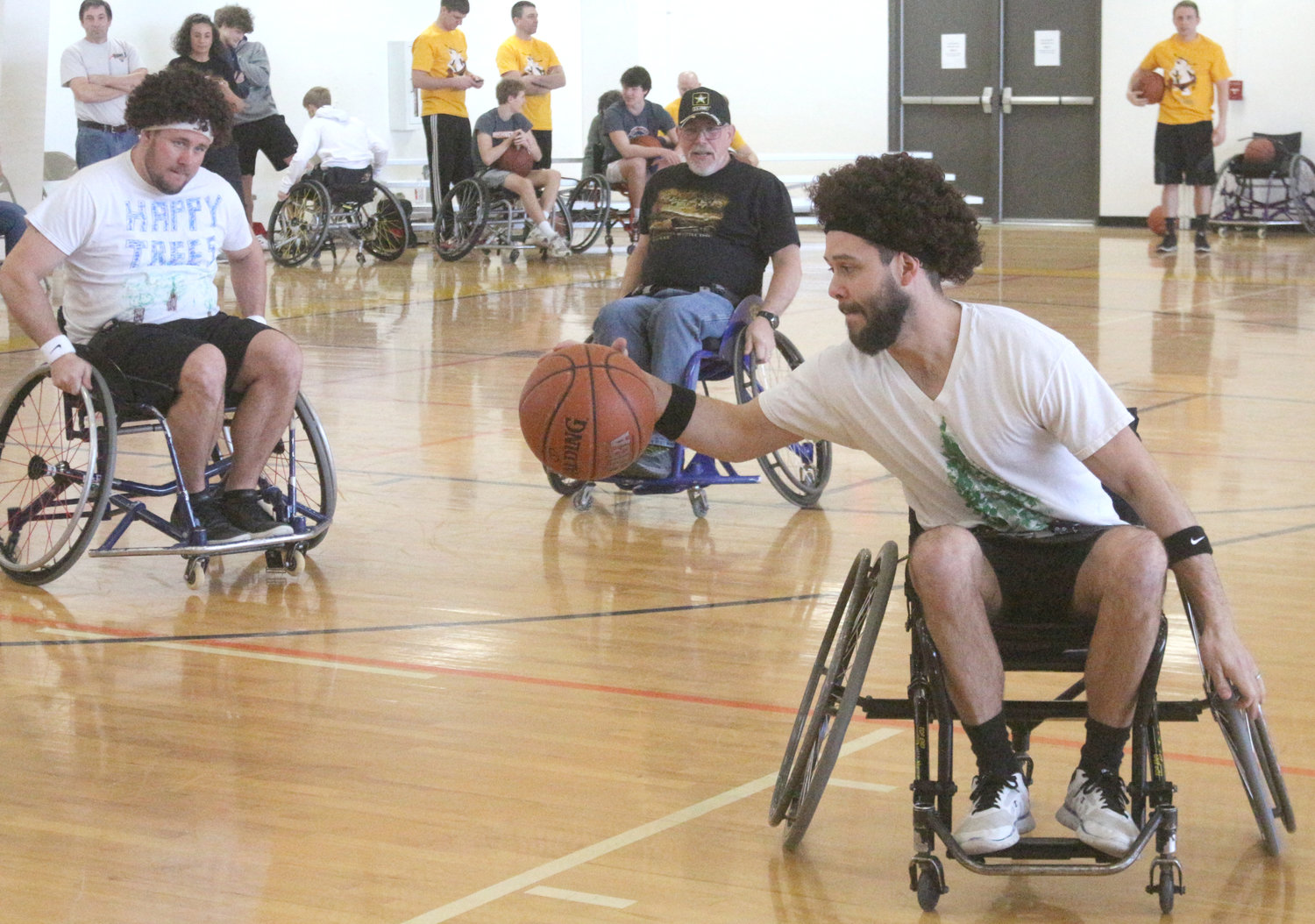 3-on-3 wheelchair basketball tournament fundraiser at Parkside Activities Center in Wellman on Saturday, March 7.