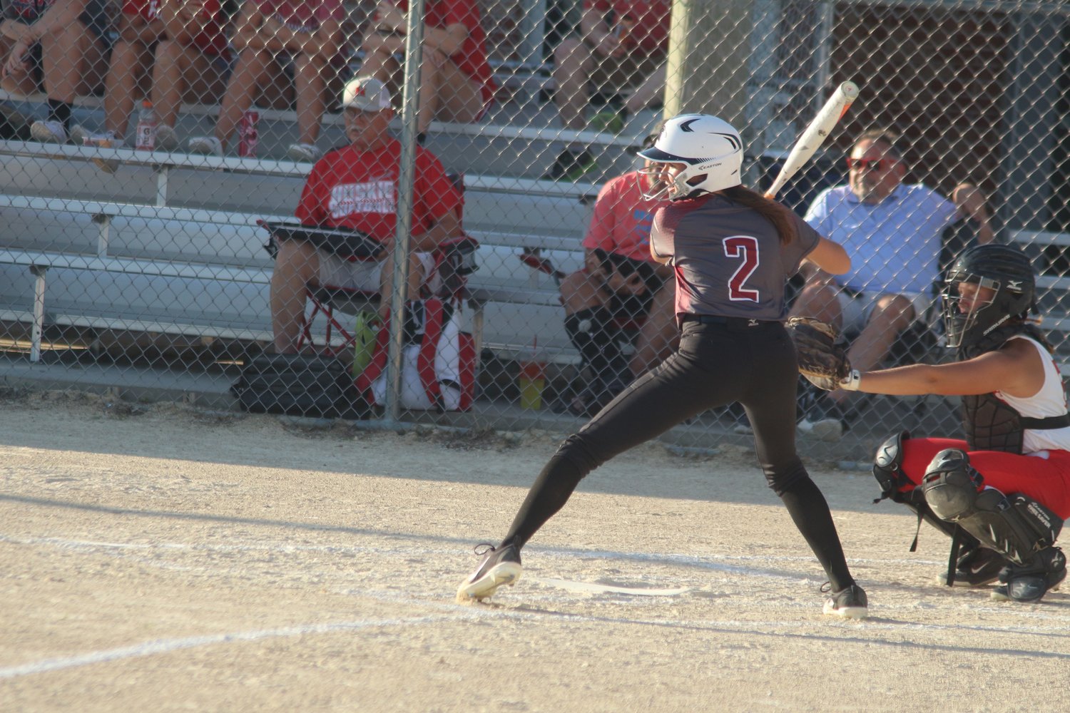 Norah Yoder of Hillcrest digs in to take a swing in Monday’s game.