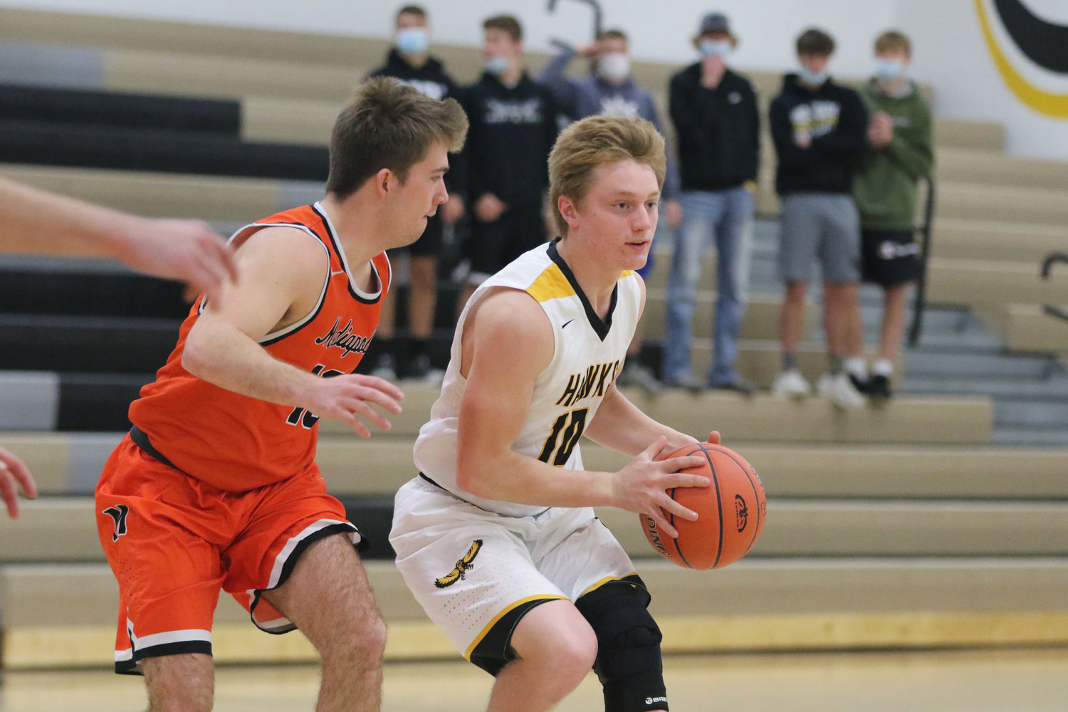 Mid-Prairie guard Luke Boyse looks for a teammate during the first quarter of a scrimmage with Mediapolis in Wellman on Saturday, November 21.
