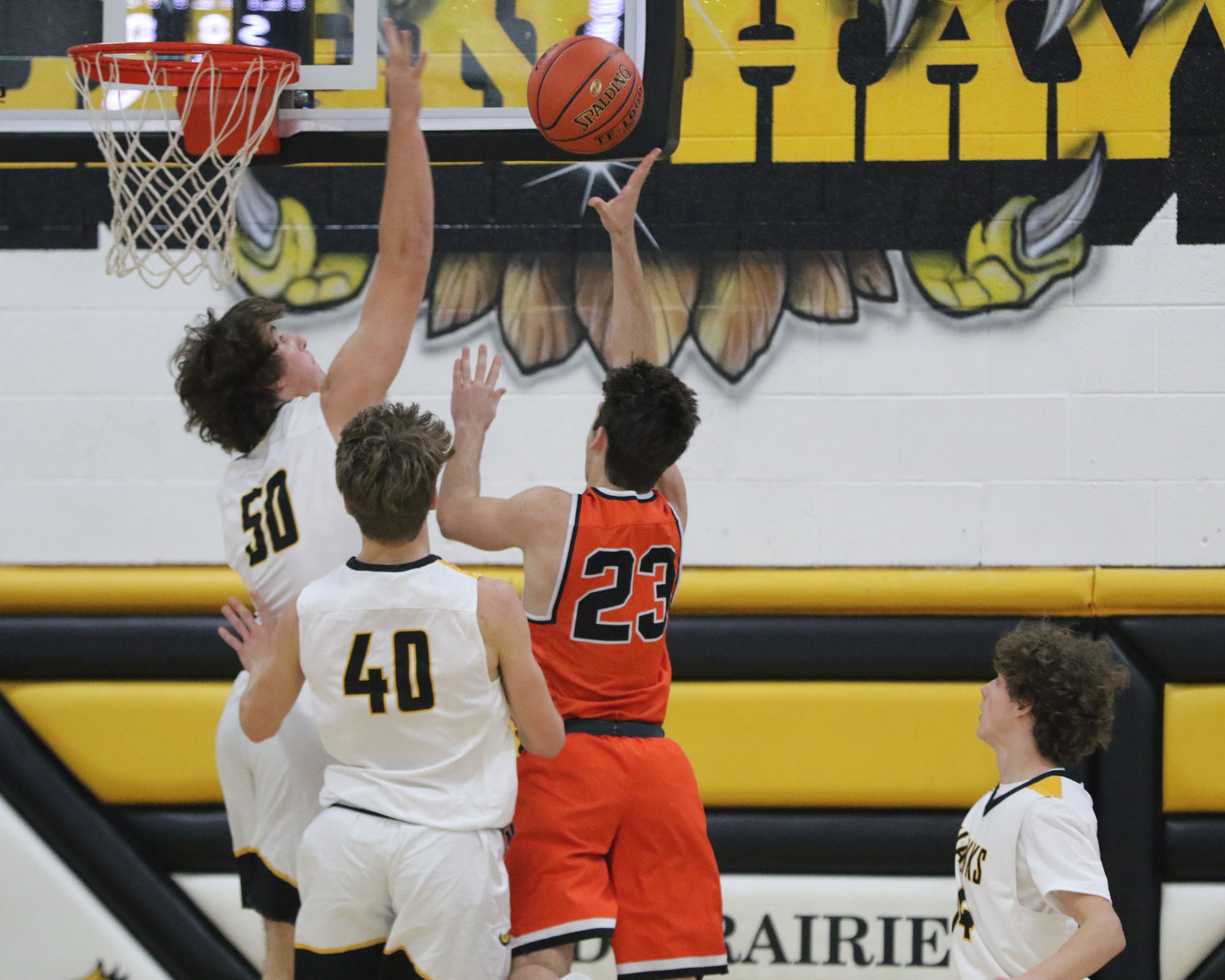 Aidan Rath blocks a shot during the first quarter of a scrimmage with Mediapolis in Wellman on Saturday, November 21.