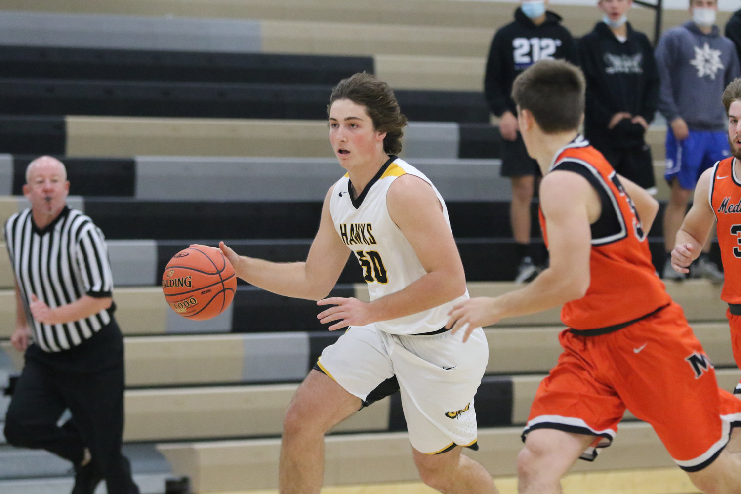 Mid-Prairie forward Aidan Rath leads a fast break during the first quarter of a scrimmage with Mediapolis in Wellman on Saturday, November 21.