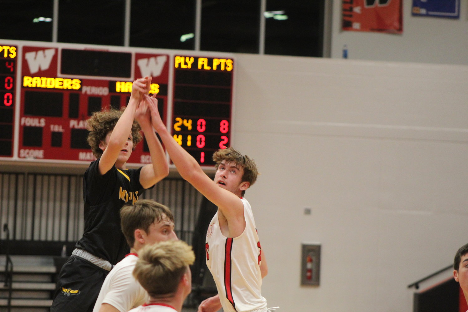 Jack Pennington of Mid-Prairie lets a shot fly in the Golden Hawks game at Williamsburg on Tuesday, Dec. 1.