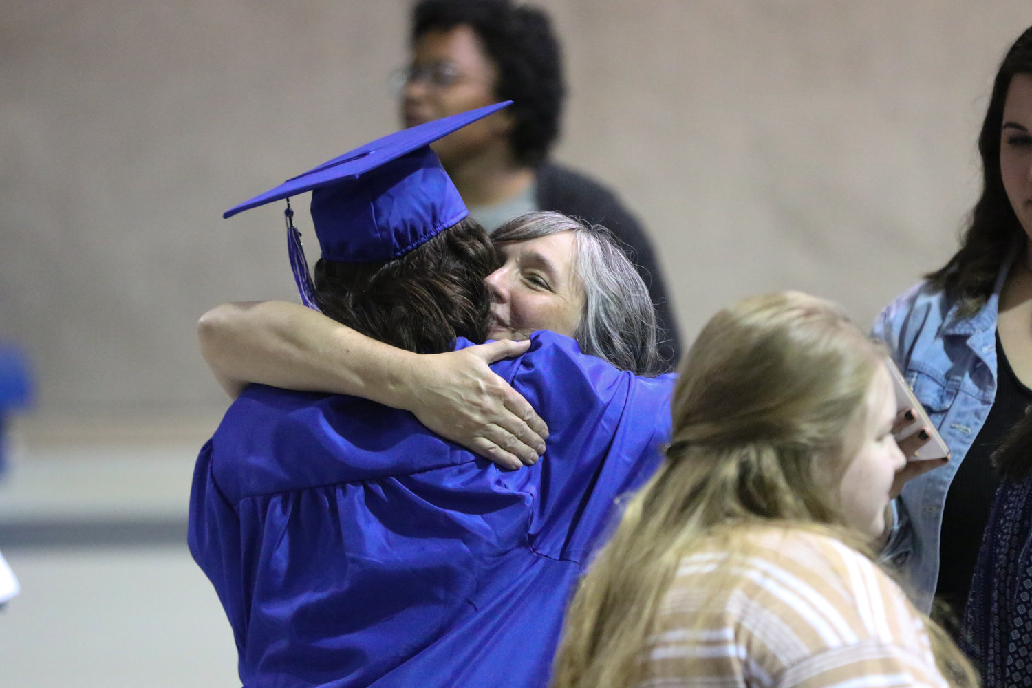 Brooke Schwartz gets a hug from her mother, Starla after Pathway Christian School's graduation ceremony on May 16, 2021.