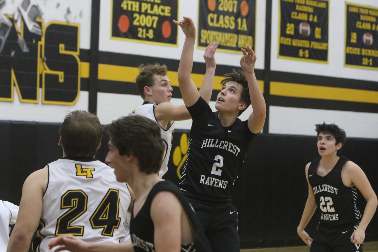 Seth Ours of Hillcrest takes a shot in Tuesday night's game at Lone Tree.