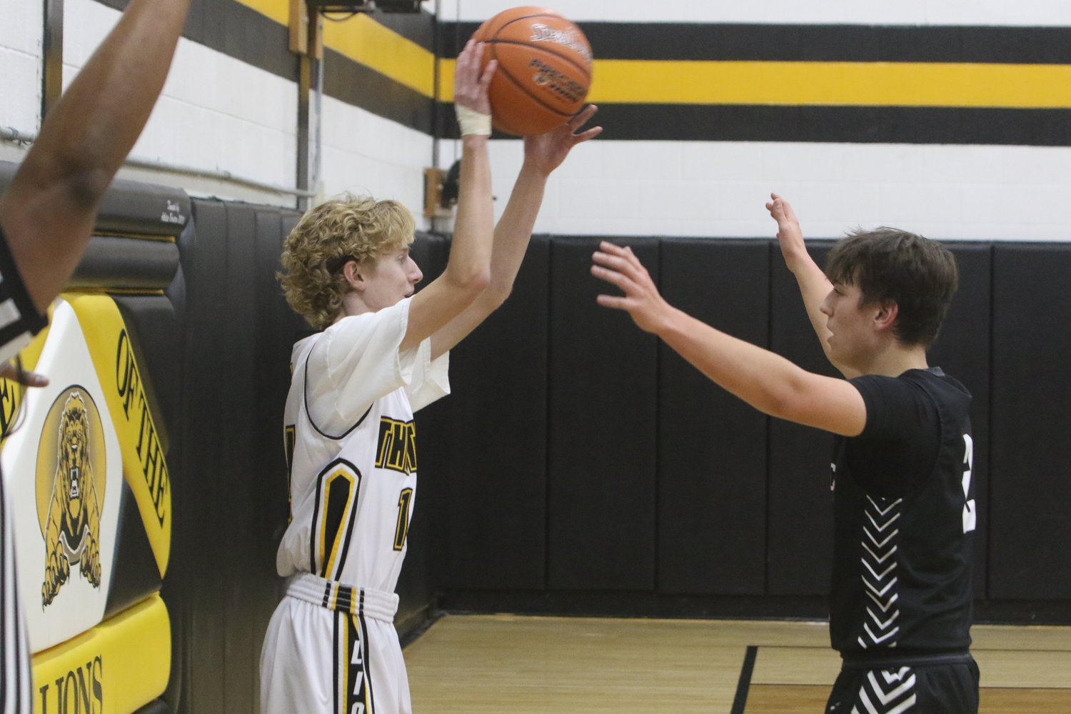 Lone Tree's Drew Gauley looks to inbound the ball against Hillcrest's Seth Ours.