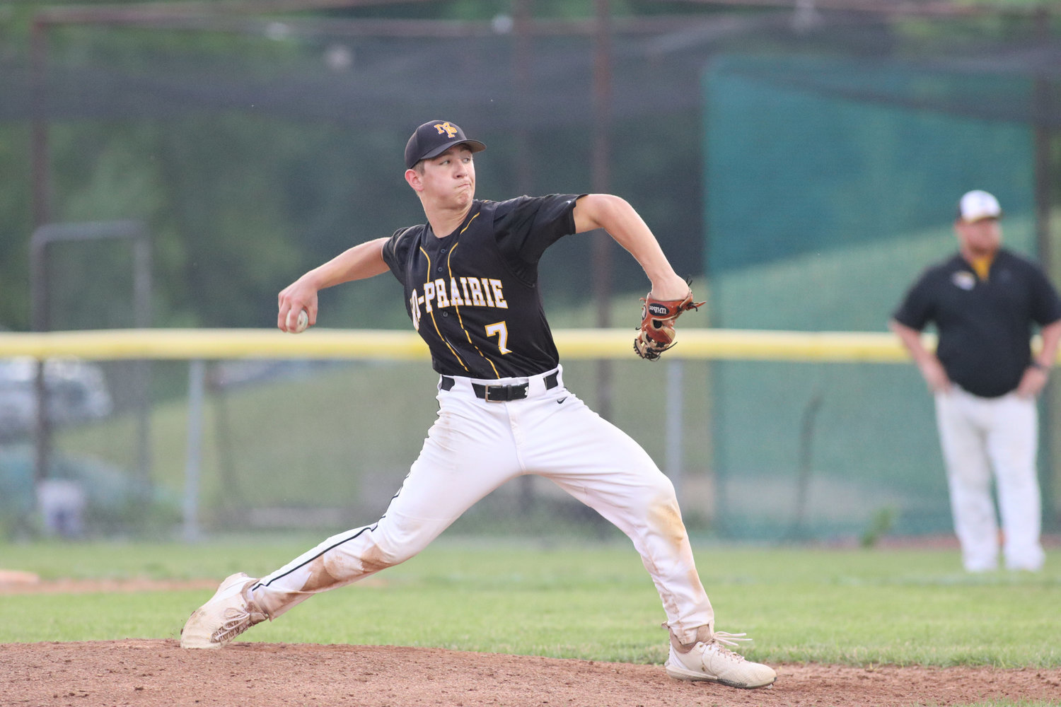 Karson Grout delivers a pitch during a Mid-Prairie win over Tipton on June 28, 2021.