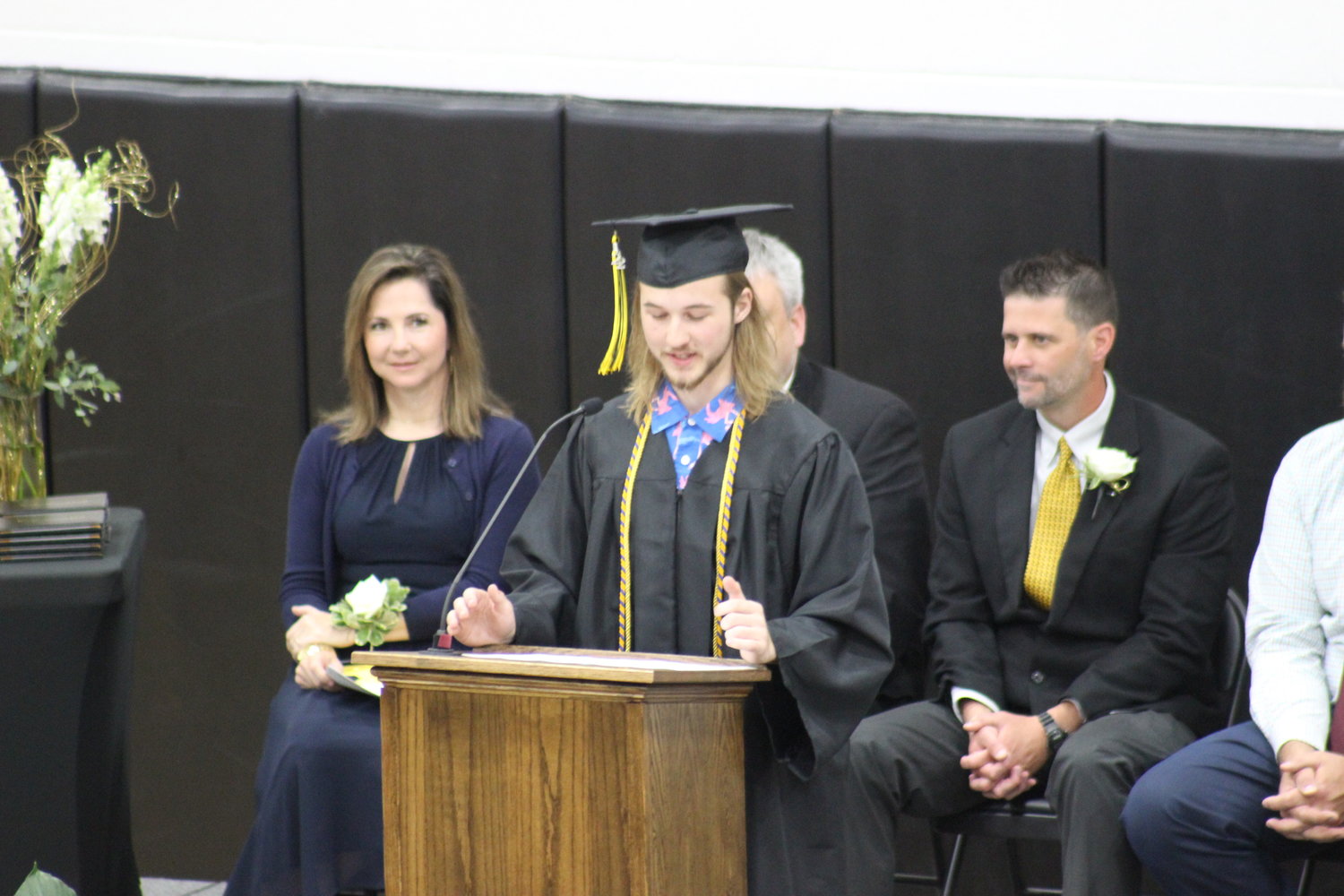 Kyle Zaruba delivers a commencement speech to his graduating class on Sunday.