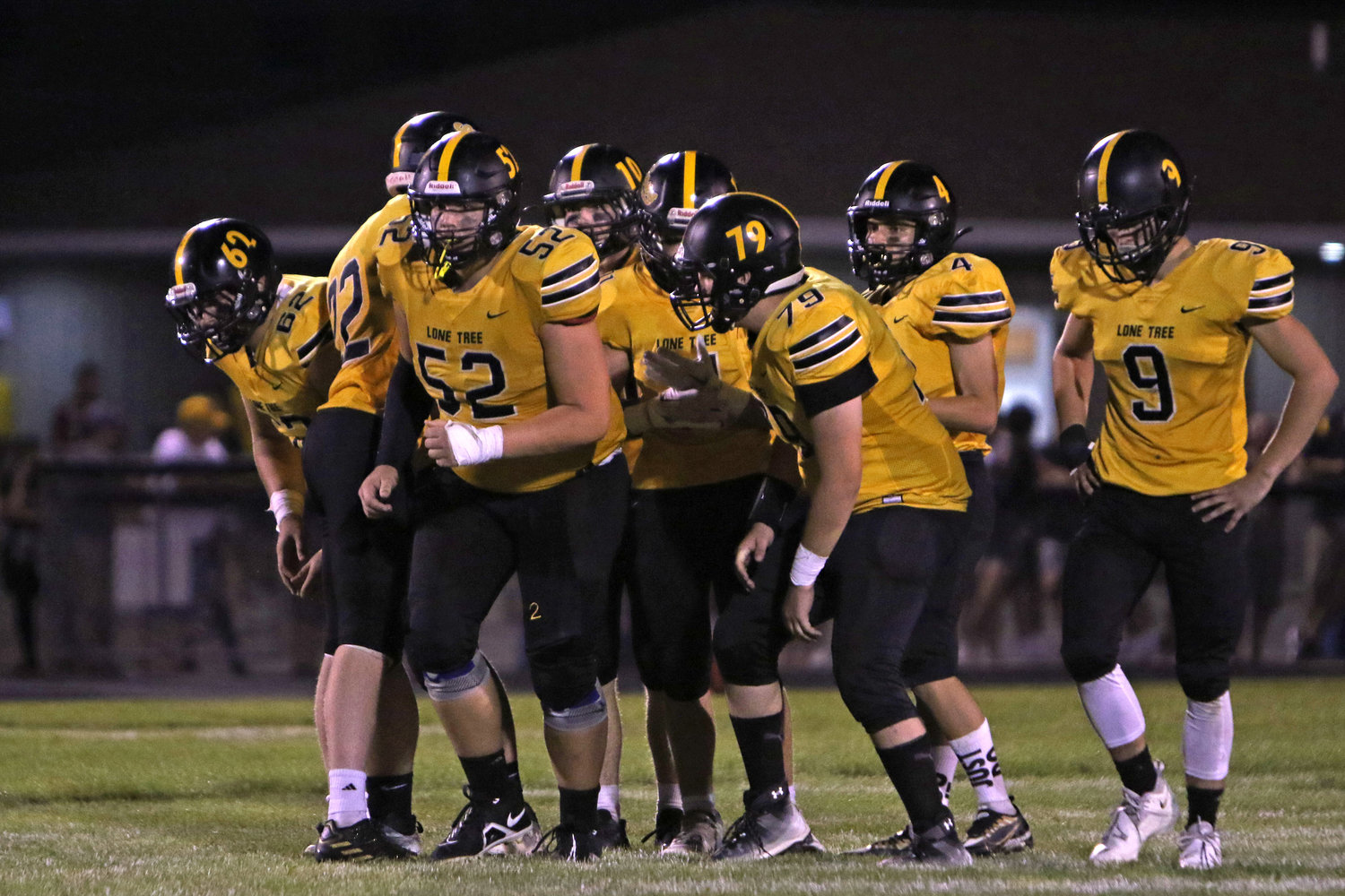 The Lone Tree offense prepares for the next snap during a 49-24 win over English Valleys.