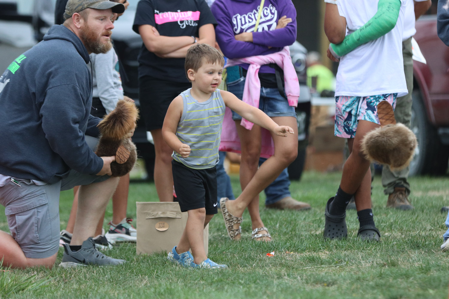 A participant throws a beaver pelt at the Kids Opossum Toss’um on Saturday morning, Sept. 10, at the at the Washington County Fairgrounds.