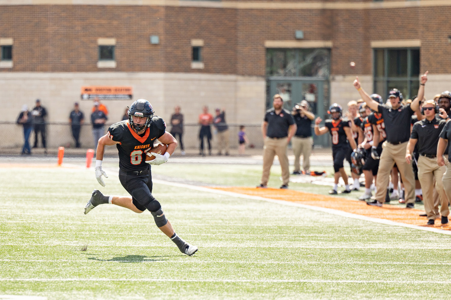 Wartburg senior tight end Tom Butters picks up yards after the catch.