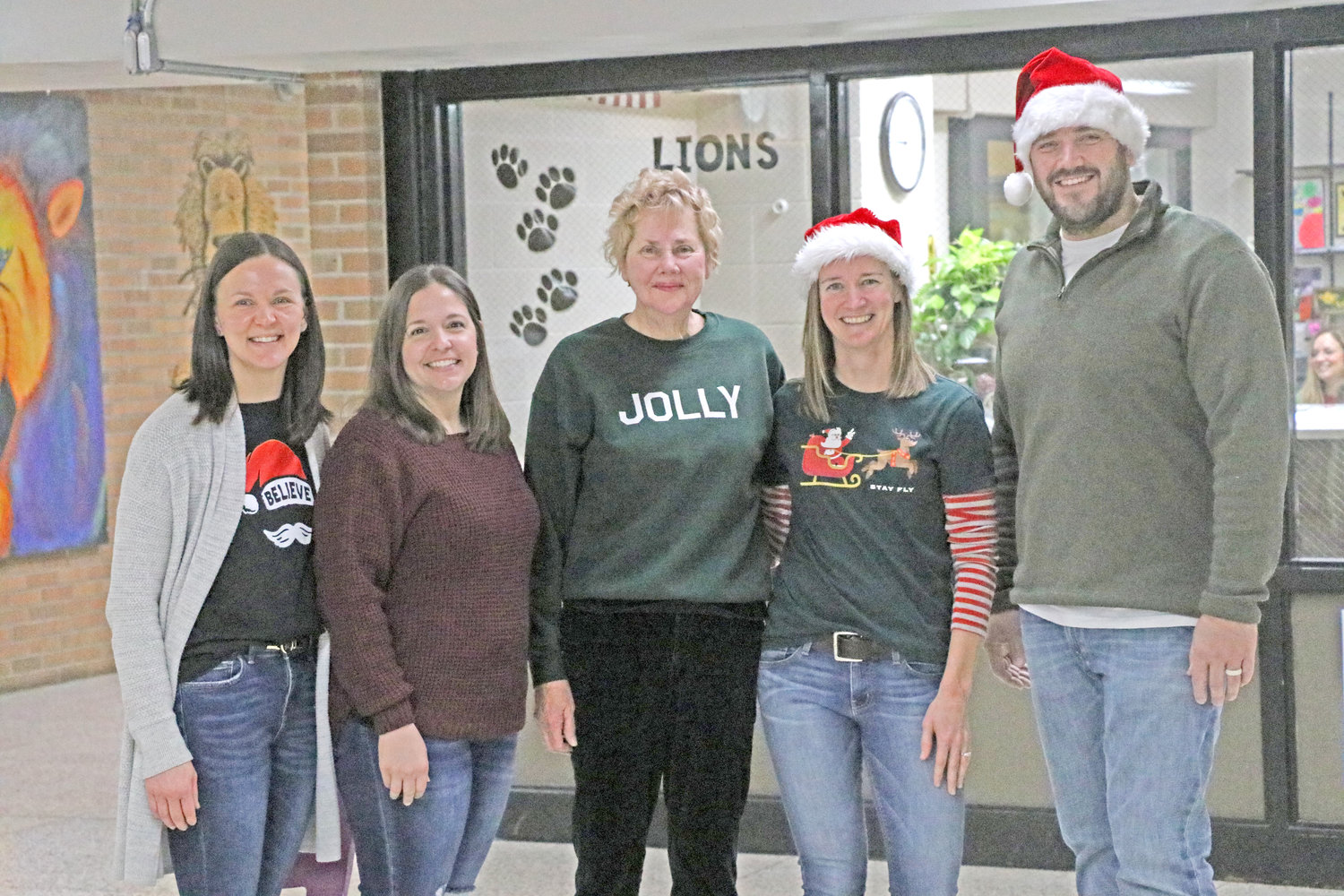 PTO and school board members pose for a picture after thanking Wanda Anderson for her time spent teaching at Lone Tree: Mallory Finn, Diana Bandow, Wanda Anderson, Jessica Hotz, Robert Sladek.