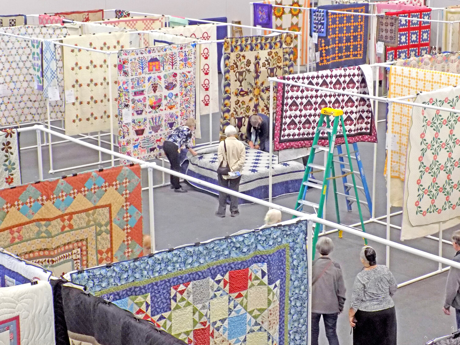 Attendees come from almost all 48 continental states to see and buy quilts in Kalona.