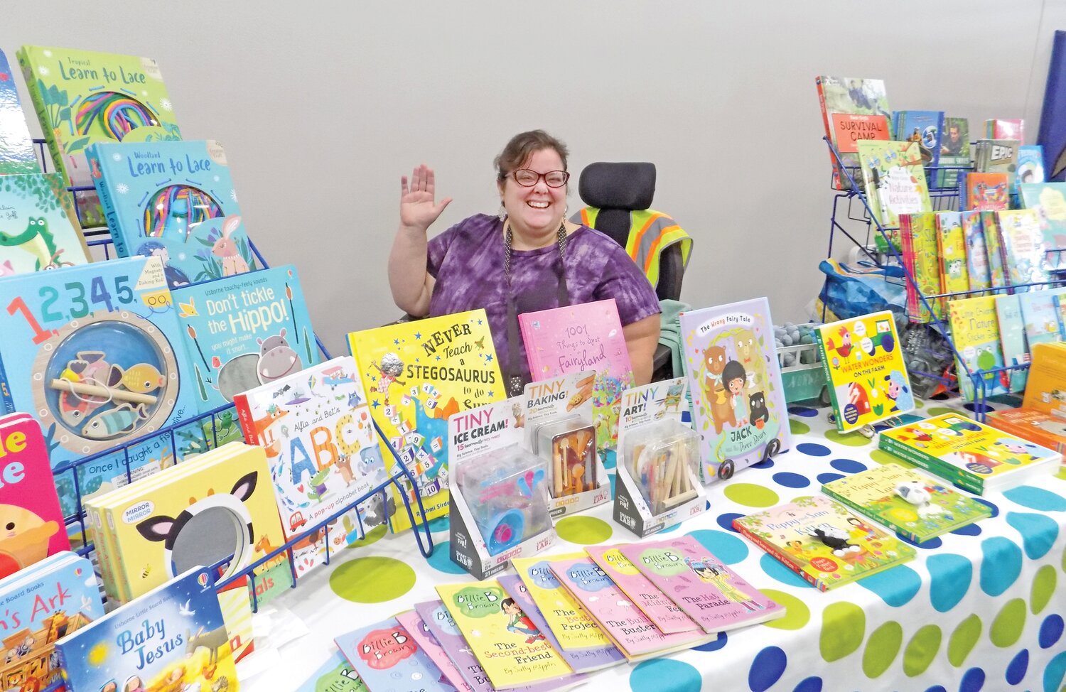 Vendors like Heather Kemp lined up along one wall to sell their giftable goods.  Kemp sold her Paperpie books and Norwex.
