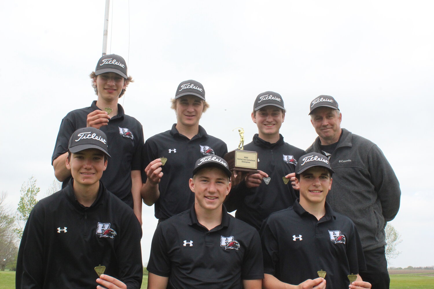 Hillcrest Academy's golf team celebrated after winning the Central Lee Invitational on May 6 in Donnellson.