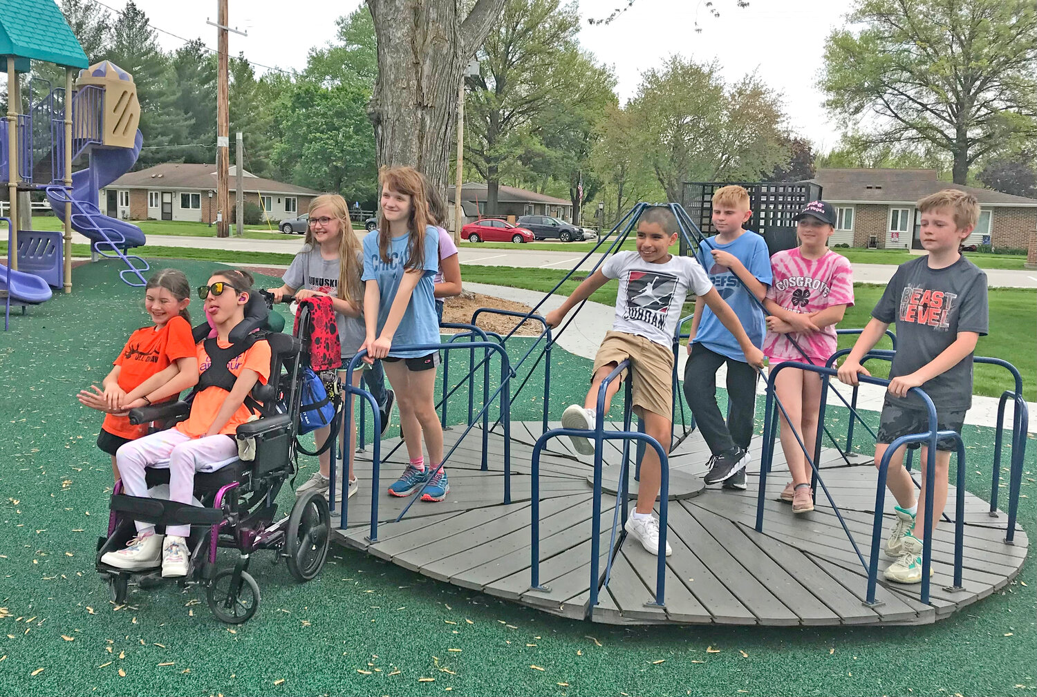 Railroad Park features newly renovated equipment and a soft surface, but also includes an ‘original’ merry-go-round installed earlier as an Eagle Scout project.