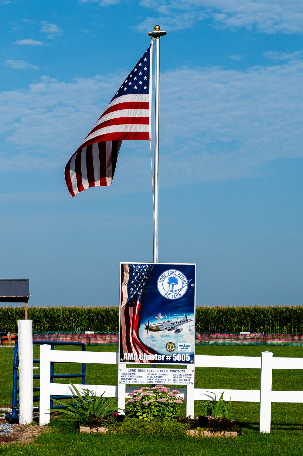 Patriotic signage at the entryway to the Lone Tree Flyers’ airfield, located next to the cemetery and American Legion in Lone Tree.