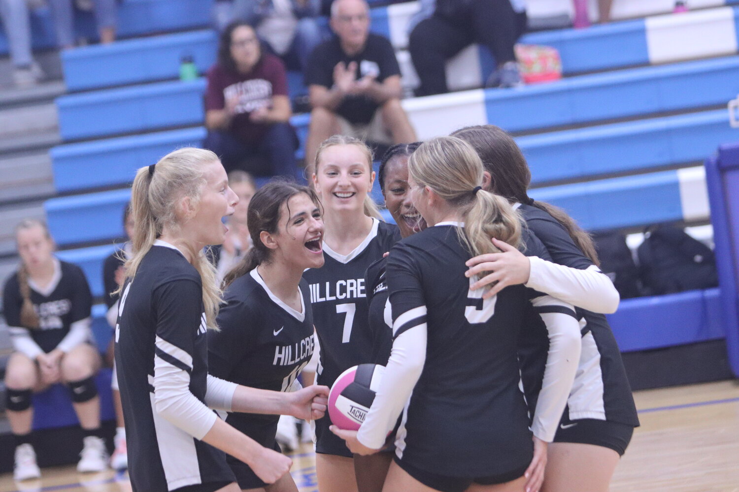 Hillcrest celebrates during a match at Columbus for the SEISC Tournament on Sept. 21.
