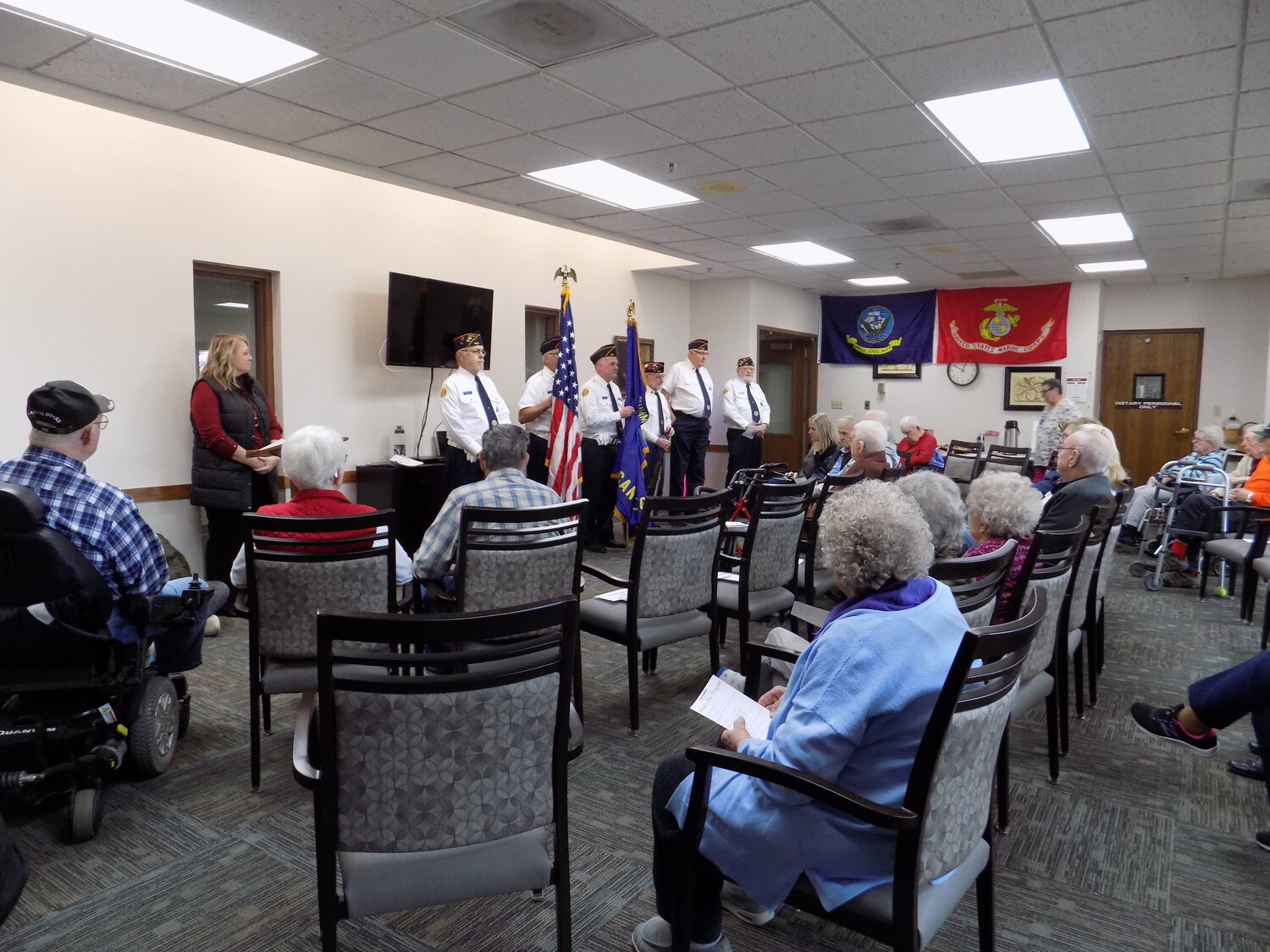 Lone Tree American Legion’s Color Guard posted the colors at Atrium Village’s Veterans Day program in Hills.