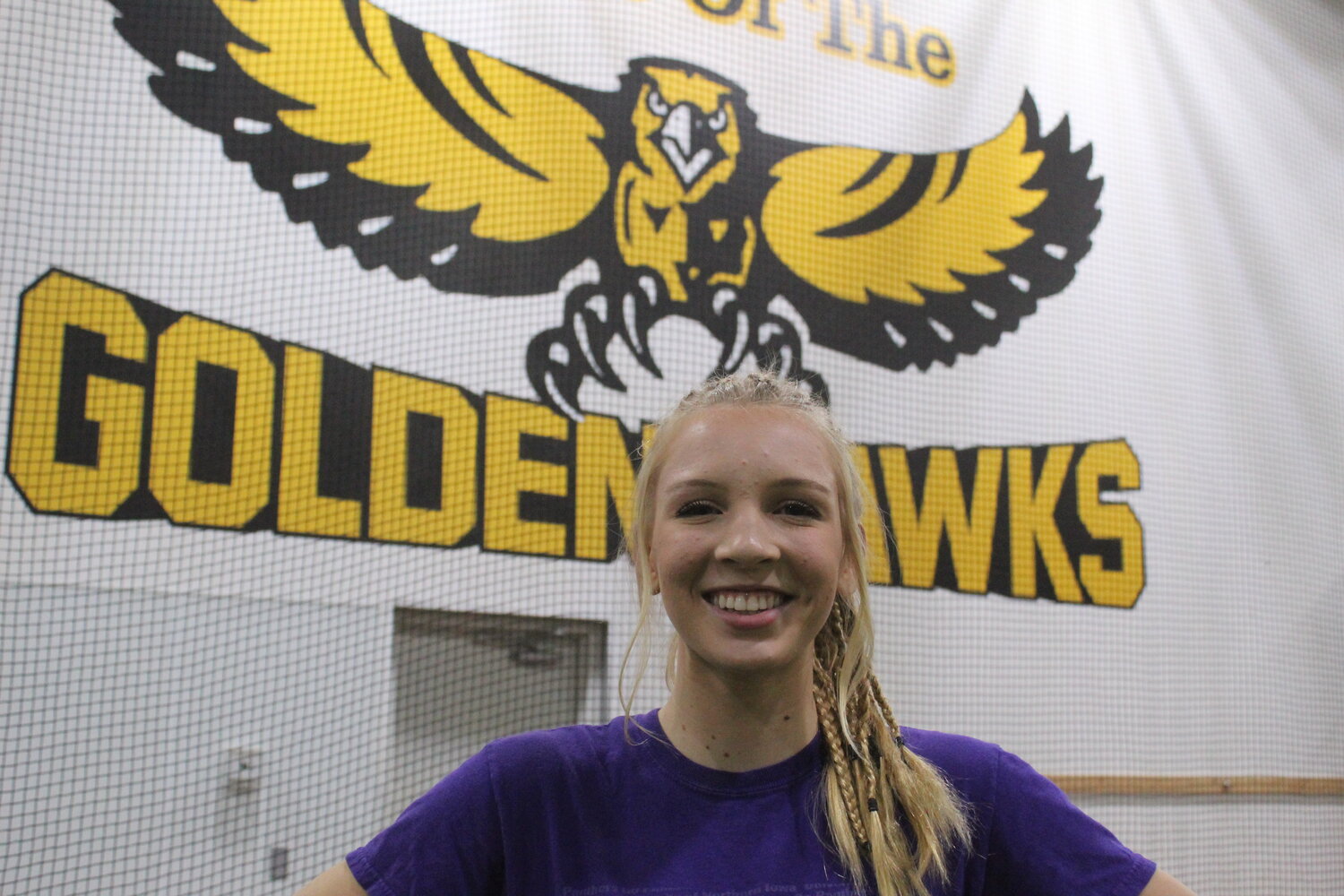 Mid-Prairie senior wrestler Ellie Brenneman dreams of returning to the school one day as a coach.